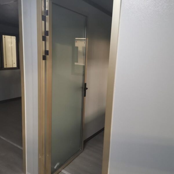 Double-wing folding house with wood-grain carved panels