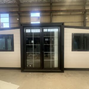 a03fae01341860a6c2c3d66a65793aec 20-foot double-wing folding room with white carved-panel exterior wall