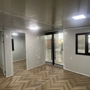 cc00b0c514f434c4acb4887cc2f6c336 20-foot double-wing folding room with white carved-panel exterior wall