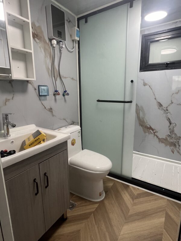 d7504407ded4e0f38ba97cc62397a8ae 20-foot double-wing folding room with white carved-panel exterior wall